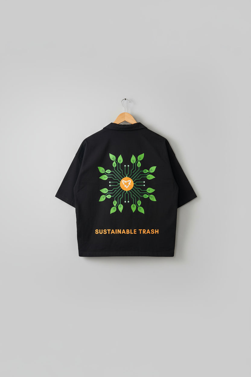 Black t-shirt with 'Sustainable Trash' design on a textured background with similar branding.